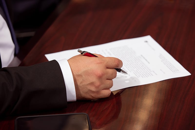 What Is Involuntary Manslaughter? Picture of someone standing with their hands held out as if not knowing what they’ve done, or someone with a questioning look on their face